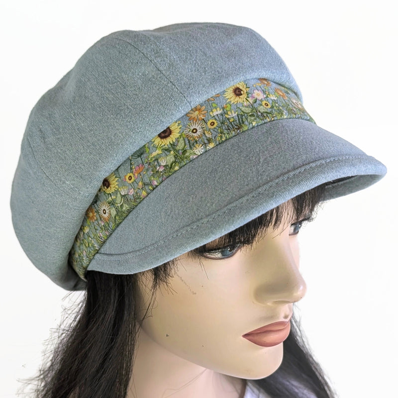 Poorboy Fashion Cap in bleached blue denim, yellow sunflower butterfly accents, flattering visor, baggy fit