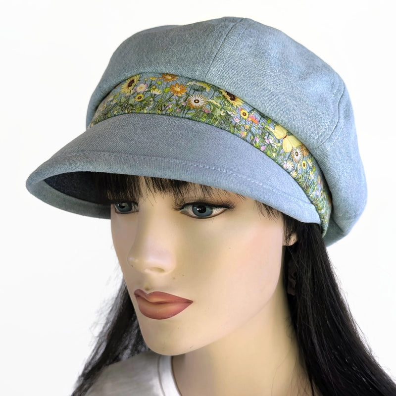 Poorboy Fashion Cap in bleached blue denim, yellow sunflower butterfly accents, flattering visor, baggy fit