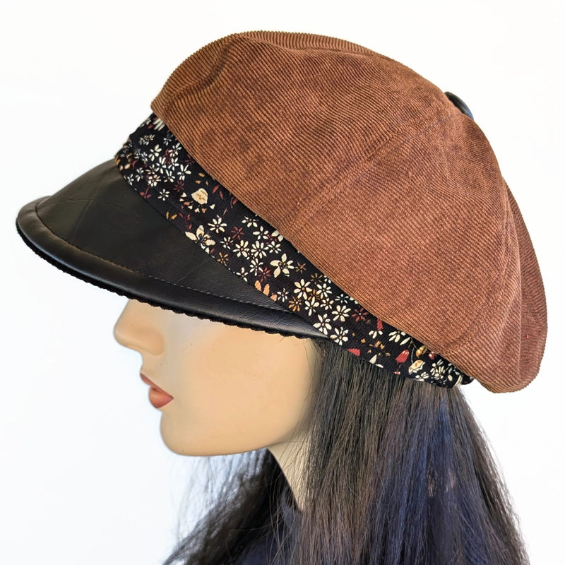 Poorboy Fashion Cap in toffee corduroy with black faux leather visor and floral print
