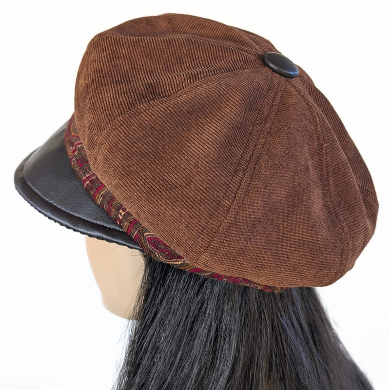 Poorboy Fashion Cap in toffee corduroy with brown faux leather visor and paisley cord print