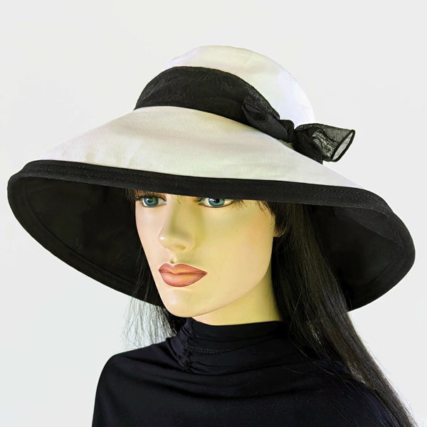 315-a Extra wide brim sunblocker in white organic cotton with black scarf and trim