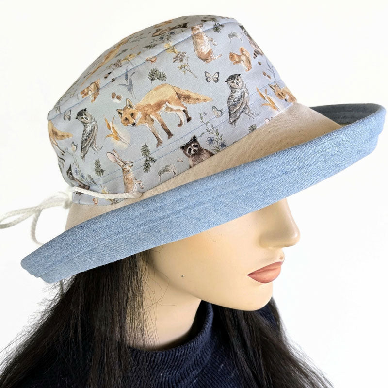 Sunblocker UV summer sun hat with large wide brim, featuring wildlife print, adjustable fit