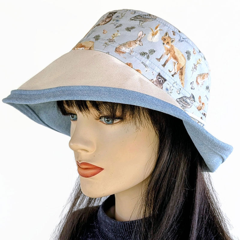 Sunblocker UV summer sun hat with large wide brim, featuring wildlife print, adjustable fit