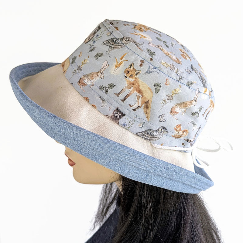 Sunblocker UV summer sun hat with large wide brim, featuring wildlife print, adjustable fit