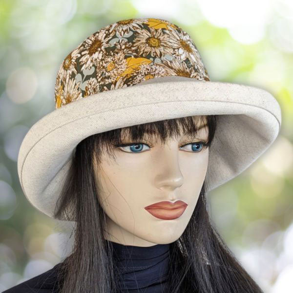 115-a Sunblocker UV summer hat with large wide brim featuring sunflowers print in earth tones
