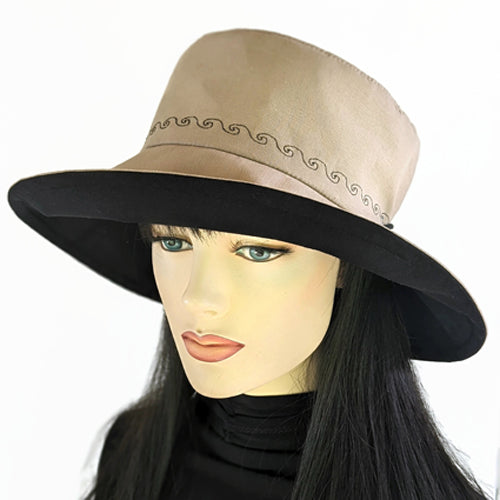 100-a Extra large bucket brim Sunblocker in neutral color with black trim, adjustable fit