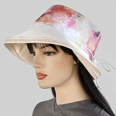 110-a Sunblocker UV summer sun hat with large wide brim with floral watercolour inspired print