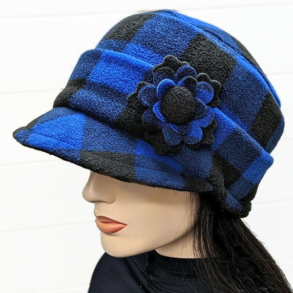 Fleece Fashion Cap with floral pin in popular plaid check, with fleece cuff and pin